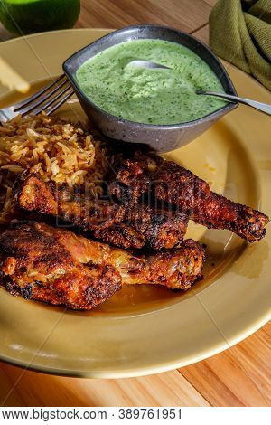 Peruvian Chicken Legs With Aji Verde Green Cilantro Sauce And Fried Rice