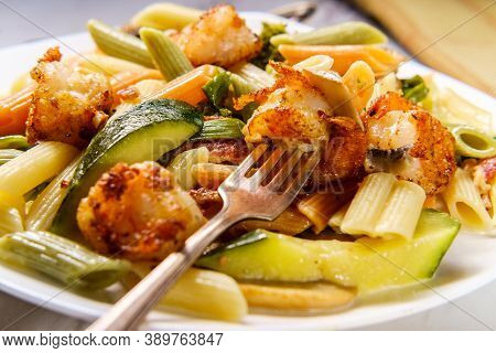 Shrimp Primavera With Tricolor Penne In A White Wine Sauce