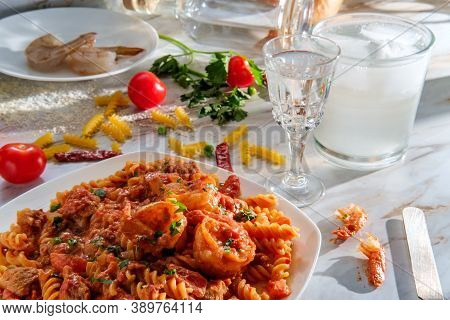 Gluten-free Fusilli Pasta In Creamy Vodka Tomato Sauce With Sausage Shrimp And Green Peas