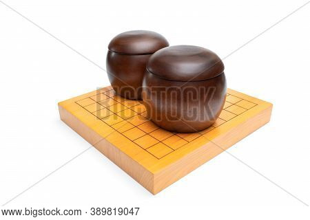 Wooden Bowls On Baduk Board Isolated On Wite Background