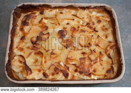 Gratin Dauphinoise, A French Potato Dish With With Cream And Layers Of Potatoes