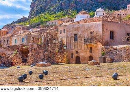Monemvasia, Peloponnese, Greece Square View With Old Houses And Church Dome In Medieval Town