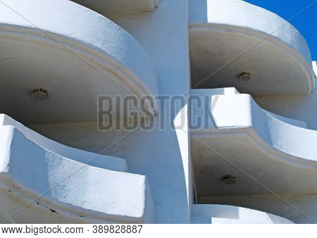 Bugibba, Malta - July 12, 2012: White Balconies Belonging To Hotel Building