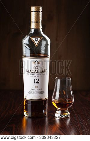 Trondheim, Norway - Mai 19 2020: Macallan single malt scotch whisky 12 years bottle and glass