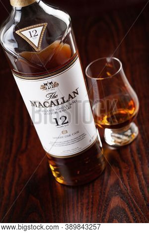 Trondheim, Norway - Mai 19 2020: Macallan single malt scotch whisky 12 years bottle and glass