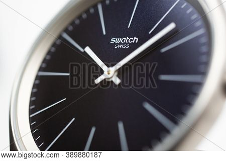Geneve, Switzerland 07.10.2020 - Swatch Logo On Blue Wristwatch Dial Of Swiss Made Quartz Watch Isol