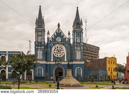 Lima, Peru - December 4, 2008: Blue Facade With White Trim Of La Recoleta Church Under Silver-brown 