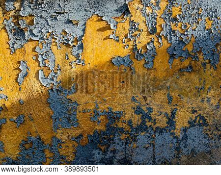 Old Chipped Blue Paint On The Concrete Wall