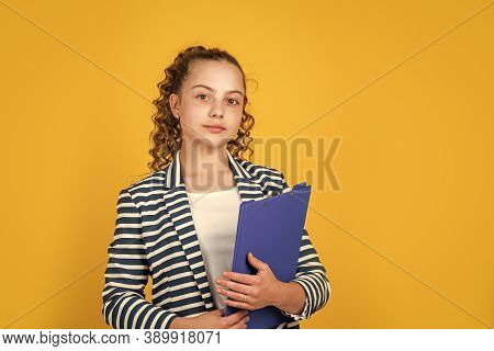 Library Assistant. Happy Girl Hold Library Folder. School Library. Knowledge And Information. Studen