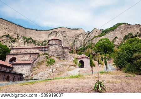 Shio Mgvime Monastery On The Background Of Rocks.
