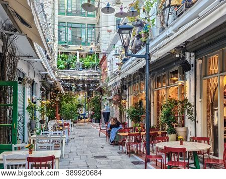 Thessaloniki, Greece - October 14 2019: Hellenic Dining Scene Of People At Outdoors Tavern Restauran