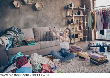 Photo Of Pretty Blogger Lady Stay Home Quarantine Making Selfies Video For Followers Showing Wardrob