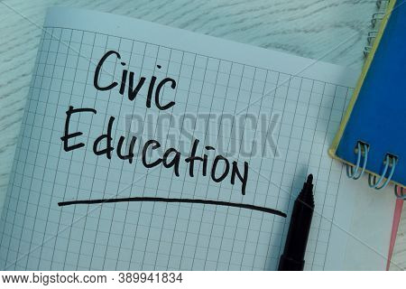 Civic Education Write On A Book Isolated On Office Desk.