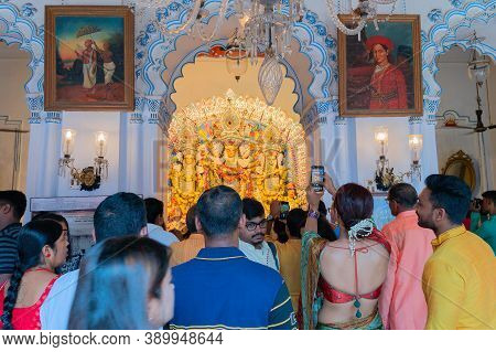 Kolkata, West Bengal, India - 6th October 2019 : Modern Sari Clad Devotee Woman Taking Picture Of Tr