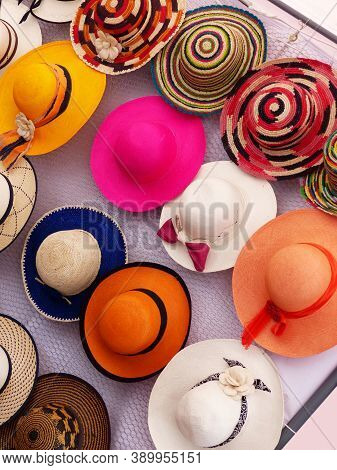 Colorful Handmade Panama Hats Or Paja Toquilla Hats Or Sombrero At The Traditional Outdoor Market In