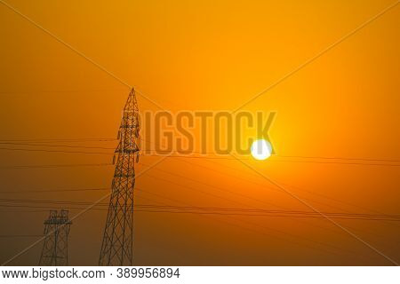 Morning View Of The Orange Sky During The Sun Rising Over The Tower