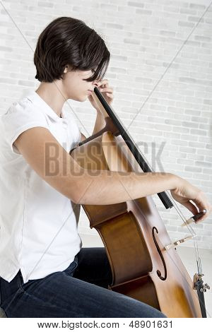 Girl is playing cello