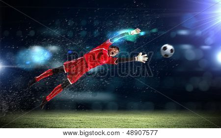 Goalkeeper catches the ball