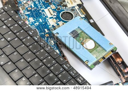 Keyboard And Hard Drive From The Disassembled Laptop