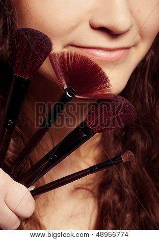woman is making make-up