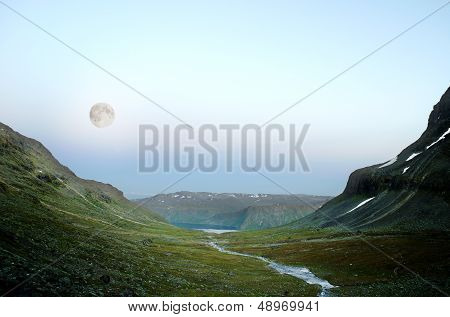Full moon over mountains