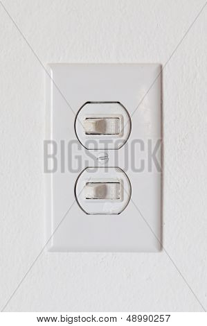 Close-up Of An Obsolete Light-switches