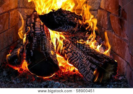 Burning Fire Wood In A Fireplace