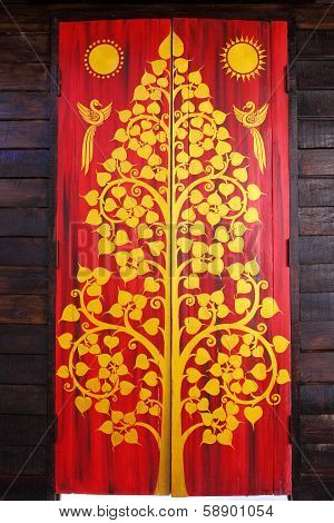 Traditional Thai Art Of Painting On The Door Of Thai Temple.