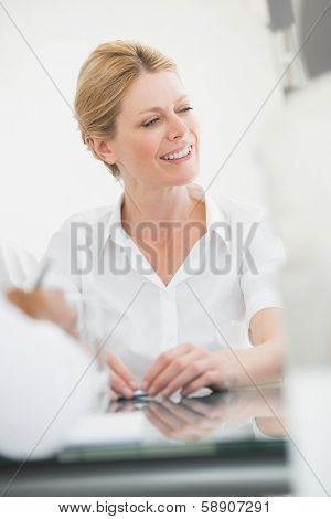 Happy businesswoman during a meeting in the office