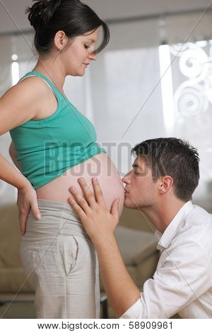 happy young cuple, pregnant woman