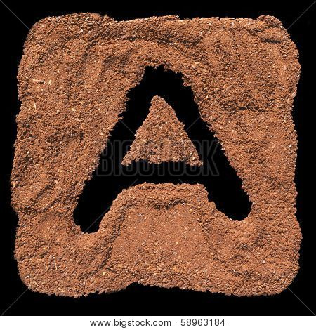 Letter A painted on the ground coffee isolated on black