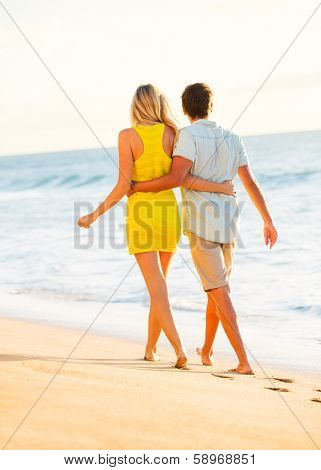Romantic Couple Enjoying Sunset on Beautiful Tropical Beach