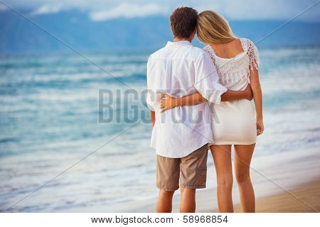 Romantic Couple Enjoying Sunset on Beautiful Tropical Beach