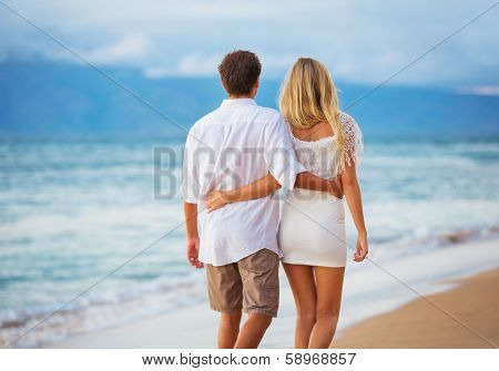 Romantic Couple Enjoying Sunset on Beautiful Tropical Beach