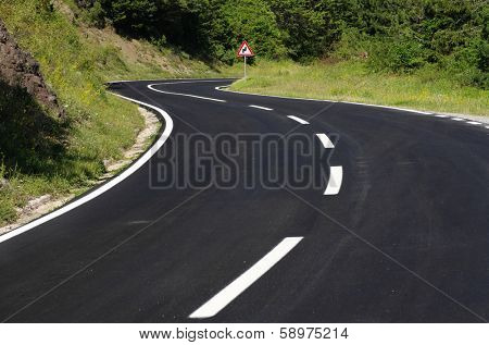  winding road black asphalt