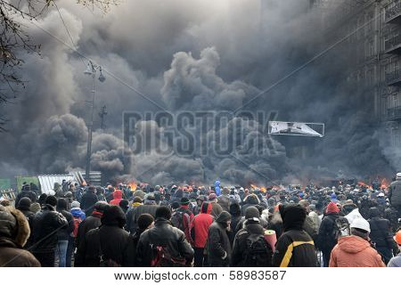 KIEV, UKRAINE - JANUARY 23, 2014: Anti-government protest in Kiev,  Grushevsky str.  People defend barricades.