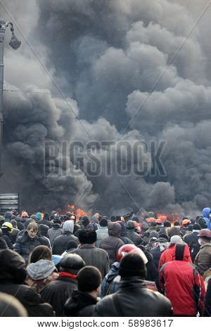 KIEV, UKRAINE - JANUARY 23, 2014: Anti-government protest in Kiev,  Grushevsky str.  People defend barricades.