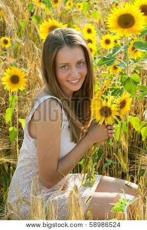 Girl in the sunflower field