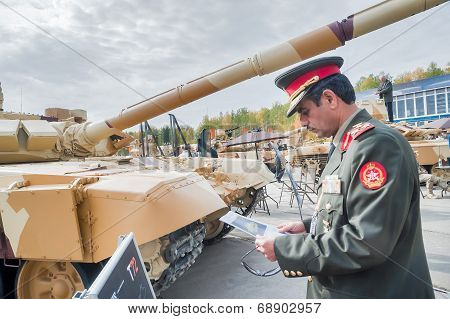 Officer of foreign army studies tank T-72. Russia