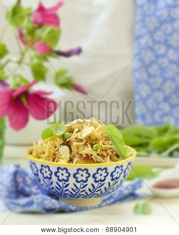 Pilaf With Chicken, Peas And Almonds