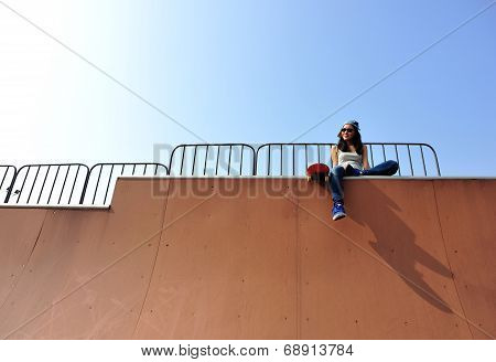woman skateboarder at skatepark