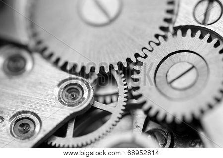 Black White Metallic Background With Metal Cogwheels A Clockwork. Macro