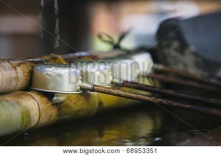 Japan, Nara, Kofuku-ji Temple, Row of ladles, close-up