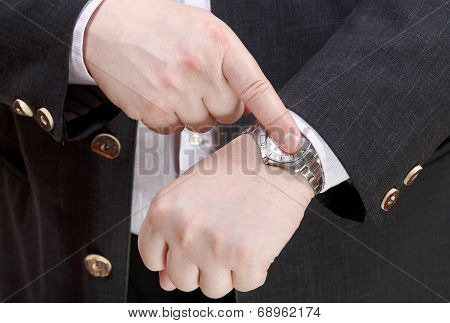 Man Show Exact Time On Wristwatch Close Up