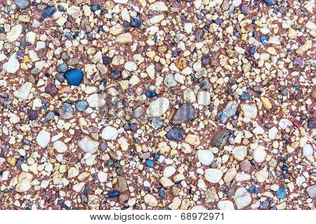 Stone On Red Soil Background