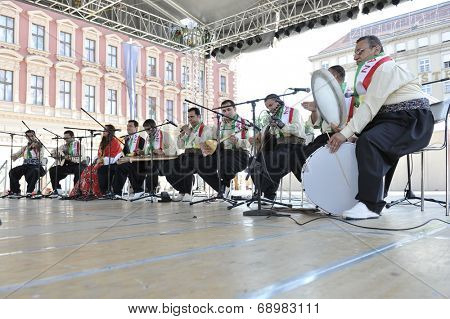 ZAGREB, CROATIA - JULY 18: Members of folk group Payiz from Sulaimaniya, Kurdistan, Iraq during the 48th International Folklore Festival in center of Zagreb, Croatia on July 18, 2014