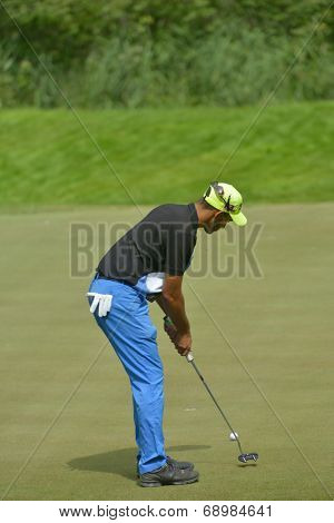 TSELEEVO, MOSCOW REGION, RUSSIA - JULY 24, 2014: James Ferraby of England in action during the M2M Russian Open. This international golf tournament is the stage of the European Tour
