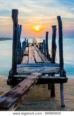 Sunset With Old Ruin Of Pier.