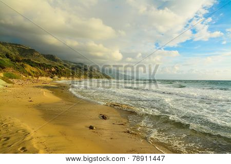Waves And Sand In La Speranza Beach