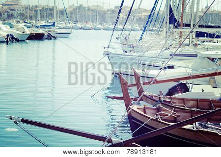 Boats In Alghero Harbor In Vintage Tone